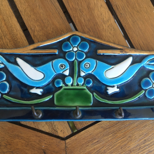 Porte clés bleu en céramique (Mithé Espelt ?)