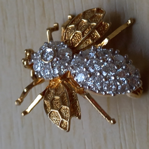 Broche or et diamants