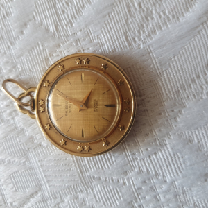 Montre pendentif or rose