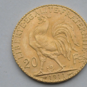 Pièce française en or (?) 20 francs 1911 .  Coq et marianne