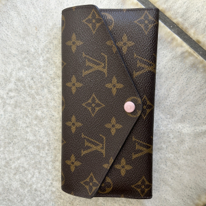 Porte feuille Louis Vuitton très bon état