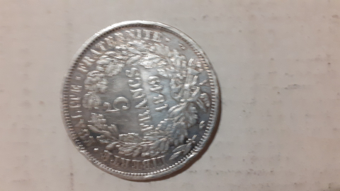 
															Piece de monnaie en argent
														