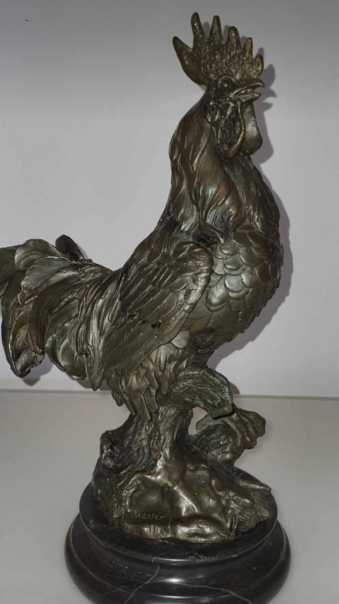 
															Coq en bronze
														