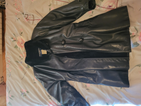 
															Veste Yves Saint Laurent cuir et fourrure
														