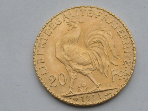 
															Pièce française en or (?) 20 francs 1911 .  Coq et marianne
														