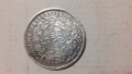 
													Piece de monnaie en argent
												