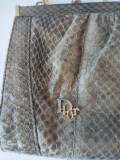 
													Sac a main Dior vintage reptile
												