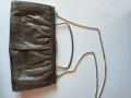 
													Sac a main Dior vintage reptile
												