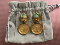 
													Boucles d’oreilles Yves saint Laurent
												