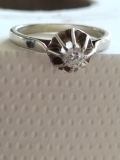 
													Bague solitaire en diamant
												