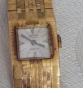 
													montre bracelet femme en or 18K, marque suisse AETOS
												