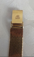 
													montre bracelet femme en or 18K, marque suisse AETOS
												