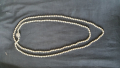 
													colliers de perles
												