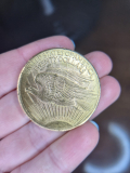 
													Pièce de 20 dollars américains
												