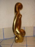 
													Femme nue en bronze doré
												