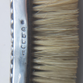 
													Ensemble 3 brosses à habit + chausse-pied
												