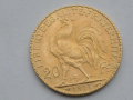 
													Pièce française en or (?) 20 francs 1911 .  Coq et marianne
												