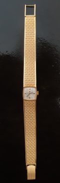 
													Montre Lip femme ancienne en or
												