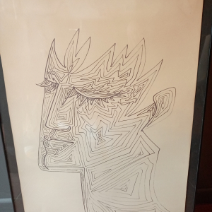 Dessin d'un portrait au feutre signe Jean Cocteau