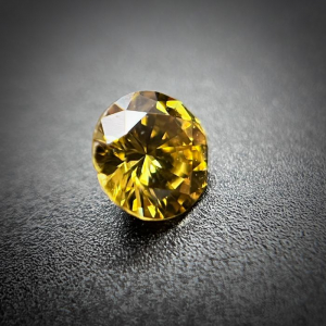 Diamant - 0.11 ct - Rond - Jaune brunâtre intense - VS1