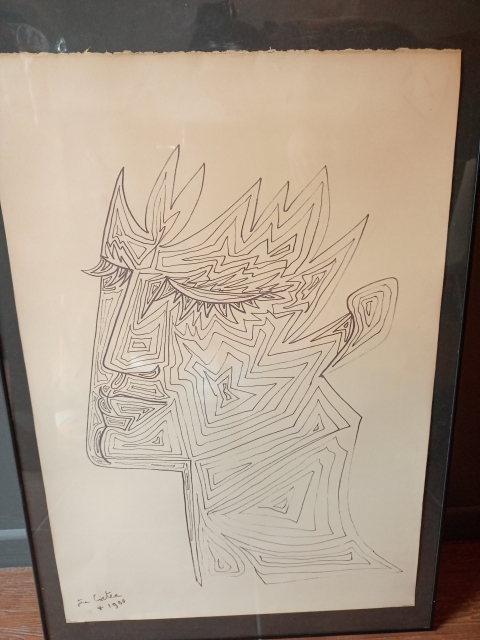 
															Dessin d'un portrait au feutre signe Jean Cocteau
														