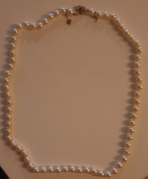 
															Collier de perles fines
														