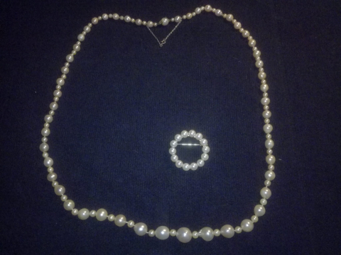 
															Collier de perles
														