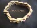
															Bracelet Boucheron Or et rubis
														