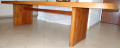 
															Parmi un ensemble de meubles d'art Pierre Chapo en orme massif - Table T20
														