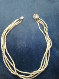 
															Collier de perle
														