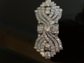 
															Broche or blanc et diamants
														