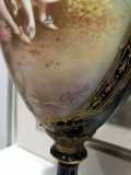 
															2 vases en porcelaine de sevres signés E.grisard
														