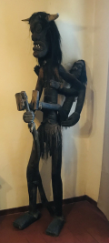 
															Statue papou
														