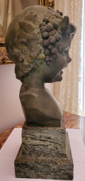 
															Tête de faune en bronze
														