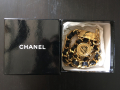 
															Ceinture Chanel chaîne or et cuir noir très bon état
														
