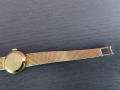 
															montre oméga en or avec bracelet or 750
														