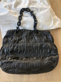 
															Sac à main cuir agneau gauffré noir PRADA
														