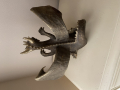 
															Sculpture en bronze représentant un dragon
														