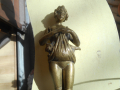 
															femme en bronze
														