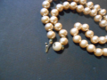 
															collier de perles
														