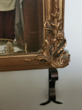 
															Miroir doré en bois ou stuc
														