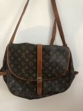 
															Sac louis vuitton vintage
														