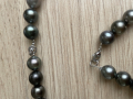 
															Collier et bracelet perles de Tahiti
														