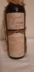 
															Millésime 1820 cognac l’heraud Grande Champagne étiquette très bonne état
														