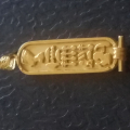 
															pendentif or massif egypte
														