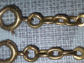
															Double bracelet en or avec pierre.
														