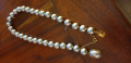
															Collier perle de culture grisecollier perle grise fermeture or
														