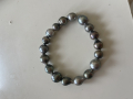 
															Bracelet perles de thaiti
														