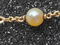 
															Bracelet or et perles
														