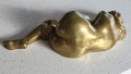 
															Bronze doré, femme nue allongée, signé L Delapchier
														